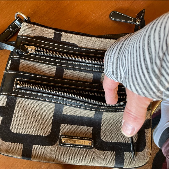 Nine West Crossbody purse in a brown/tan abstract pattern. - Picture 3 of 9